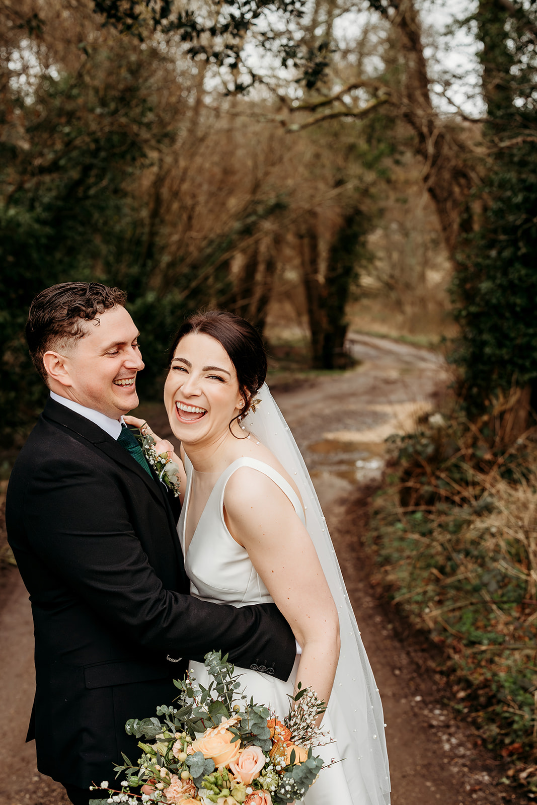 bride and groom photo taken by Southdowns Manor Petersfield wedding photographer